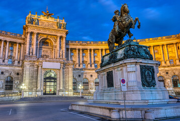 Fototapeta na wymiar The Prinz Eugen Statue with part of the Hofburg in Vienna at night