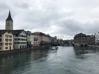lake view near tower of Saint Peter and Fraumünster Church in Zurich, Swiss, Switzerland