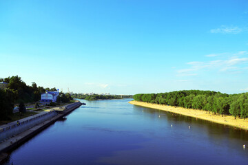 Fototapeta na wymiar River Sozh with beach in central park of Gomel in summer season. Republic of Belarus