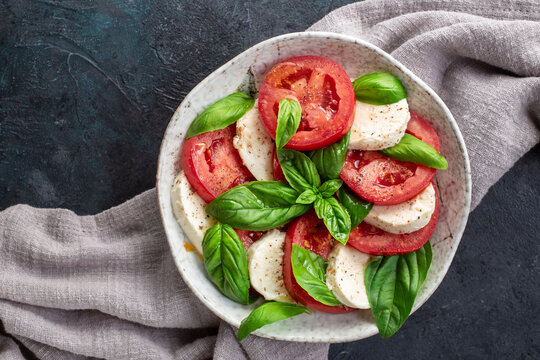 Caprese salad with mozzarella, basil and tomatoes