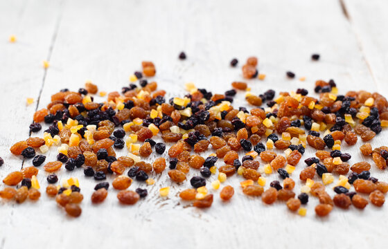 Dried fruit mixture on a white wooden background