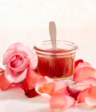 Rose honey win a jar with rose water and dried rose petals