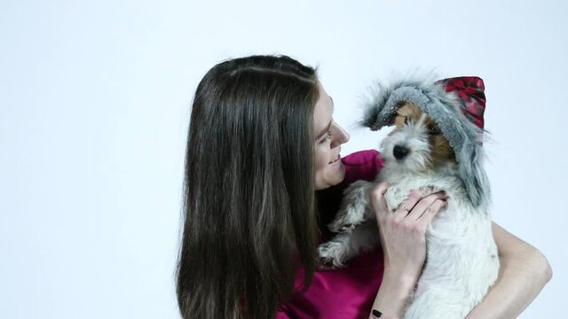 Woman close up portrait woth her puppy