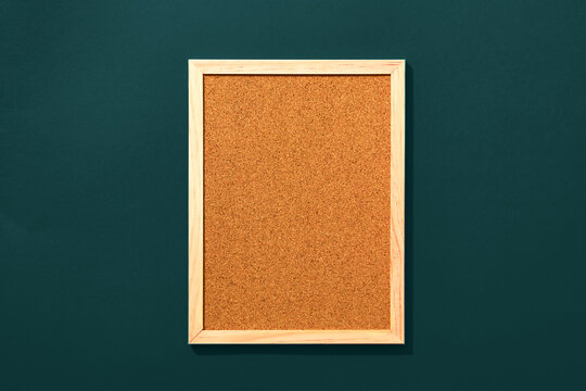 Empty coark board on red background