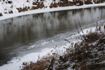 beautiful winter landscape Chemrovka river with rocky rifts