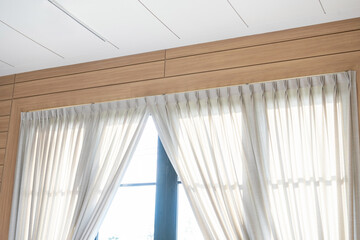 Obraz premium Beautiful curtains with ring-top rail, Curtain interior decoration in living room