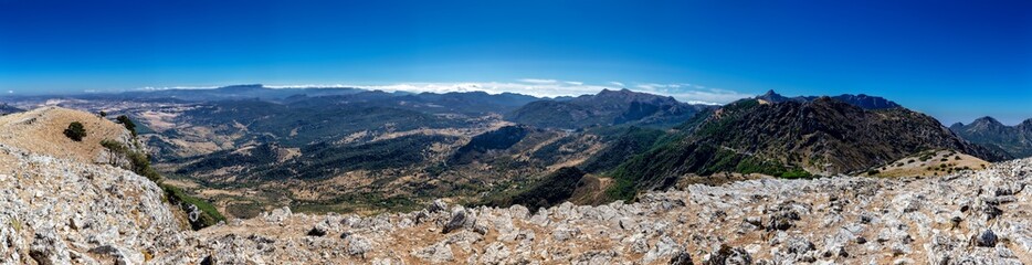 Fototapeta na wymiar View from the summit of Cerro Coros at the mediterranean landscape in the natural park Sierra de Grazalema, Andalusia, Spain.