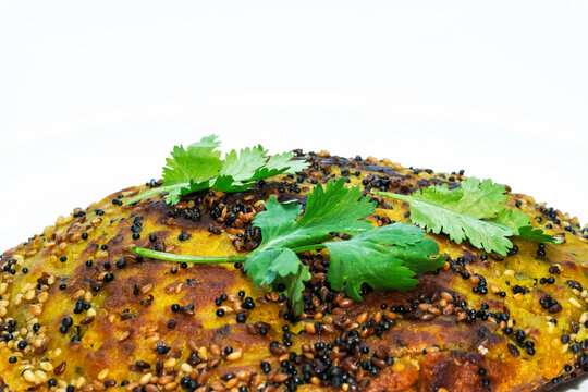 Very Close up Gujarati Handvo / Handwa Vegetable Cake Gujarati Originating sprinkle coriander leaves on it