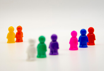 Small plastic men on a white background.