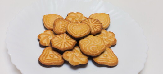 Chocolate chip cookies on a white plate