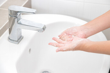 Washing your hands with soap for cleaning helps prevent germs