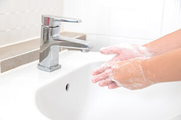 Washing your hands with soap for cleaning helps prevent germs