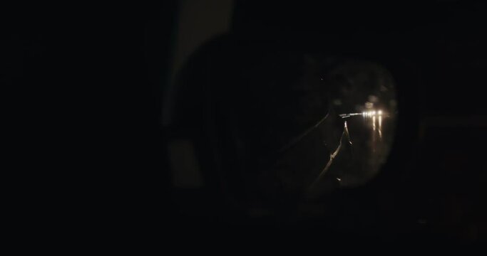 Car side mirror view rain water at night highway overtake truck lorry