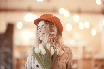 Fototapeta premium wind hair flowers spring girl / happy model posing for photo, spring portrait of girlfriend