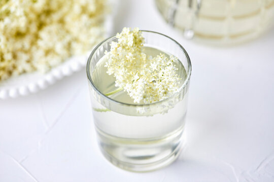 Homemade elderflower juice in a glass