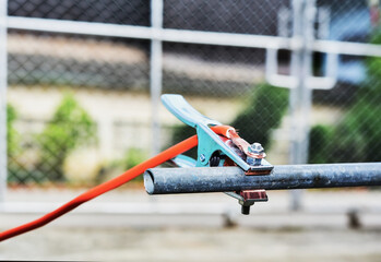 Safe workplace welding earth ground cable connector clipping connecting on steel pipe