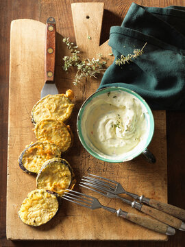 Fried aubergine slices with dip