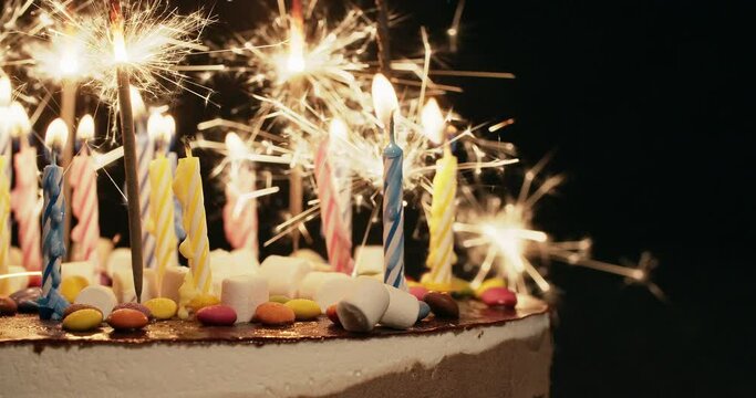 Birthday cake with sparkler and candles