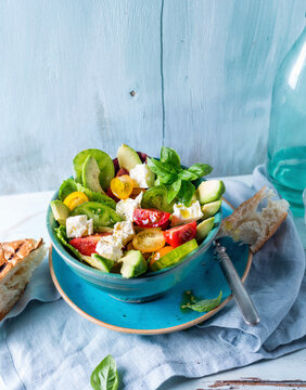 Avocado And Tomato Salad With Basil And Grilled Flatbread