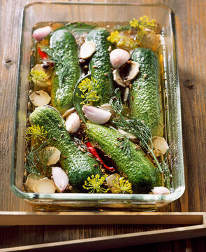 Spicy gherkins with horseradish, chilli, dill flowers and vinegar