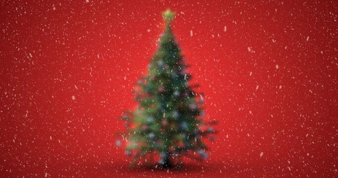 Animation of christmas tree with snow falling on red background