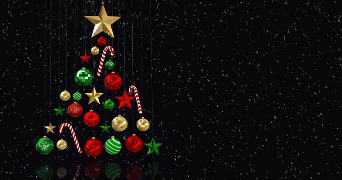 Animation of baubles christmas tree with snow falling on black background