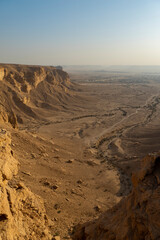 Tourists gather at Edge of the World escarpment near Riyadh, Saudi Arabia