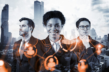 Group of SMM specialists working on social media marketing strategy to achieve business goals. Hologram icons over Bangkok background.