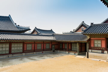 Fototapeta premium Korean wooden traditional house with black tiles in Gyeongbokgung, also known as Gyeongbokgung Palace or Gyeongbok Palace, the main royal palace of Joseon dynasty.