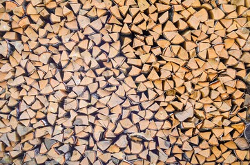 Close-up of a wooden wall. Firewood. Billet.
