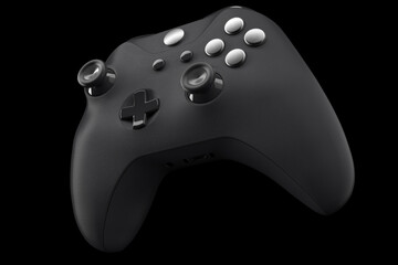 Realistic video game controller isolated on black with clipping path. © Vasyl Onyskiv