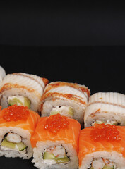 Sushi on black background