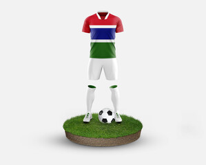 Gambia soccer player standing on football grass, wearing a national flag uniform. Football concept....