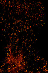 Fototapeta na wymiar flame of fire with games on a black background