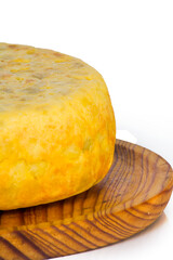 Tasty spanish omelette on a wooden tray on white background