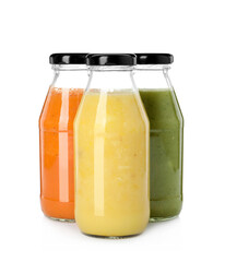 Bottles of fresh juices on white background