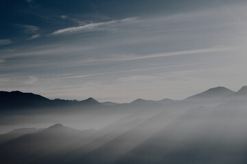 Misty mountains at sunrise landscape photography