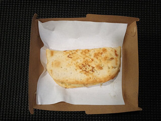 Pan pizza sandwich with cheese and other toppings