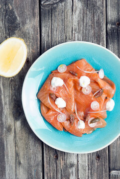 Smoked Salmon Platter With Capers, Radish, Onions And Cheese