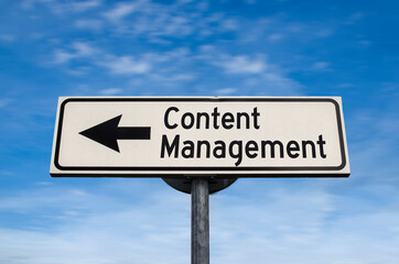 Fototapeta premium Content management road sign, arrow on blue sky background. One way blank road sign with copy space. Arrow on a pole pointing in one direction.