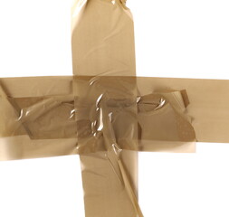 Brown sealing duct tape cross isolated on white background, top view