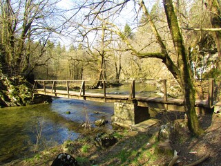 Wooden bridge above Rak creek in Rakov Skocjan