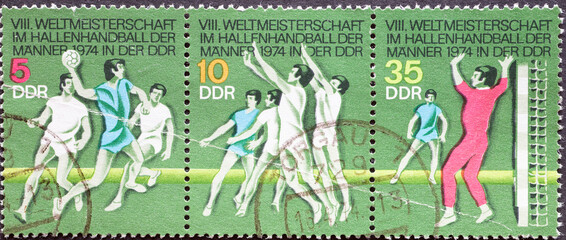 GERMANY, DDR - CIRCA 1974 : a postage stamp from Germany, GDR showing the 1974 men's indoor...