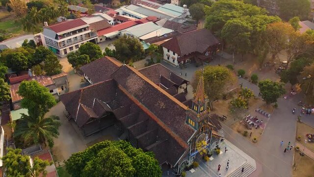 Aerial view of Go (Wooden) Church in the city of Kon Tum in the Central Highlands of Vietnam is an ancient relic with unique wooden architecture of high aesthetic value