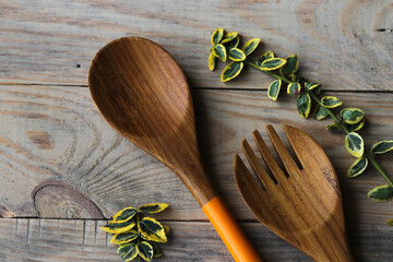 wooden spoons on wooden background