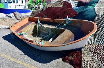 Obraz premium Old galician wooden rowboat in a harbor. Portosin, Coruña Province, Rias Baixas, Galicia Region, Spain.