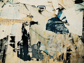 Fototapeta premium Vintage old posters stuck and torn on the wall in your grunge background