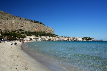 Naklejka na ściany i meble Mondello, Sicily, evocative image of the beach with clear water and a beautiful blue sky