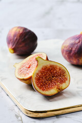 Fresh figs, whole and cut on slices