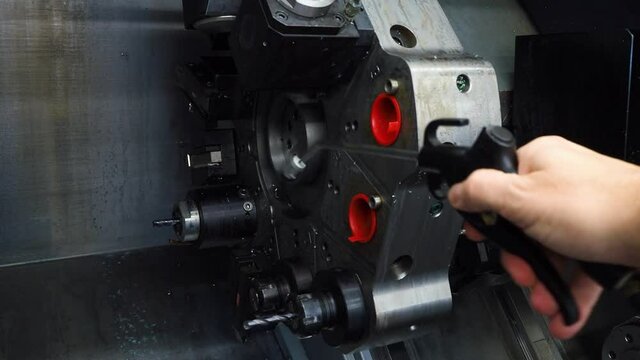 CNC machine cleaning after milling and drilling with air pressure pistol